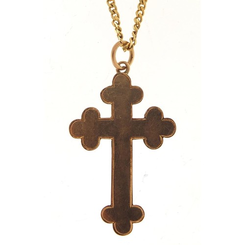 548 - 9ct gold cross pendant on a 9ct gold necklace, 2.8cm high and 44cm in length, total 3.4g