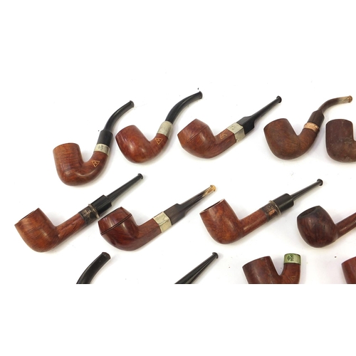 233 - Collection of vintage smoking pipes mostly with silver plated or gold coloured metal collars includi... 