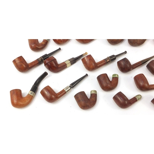 233 - Collection of vintage smoking pipes mostly with silver plated or gold coloured metal collars includi... 