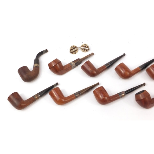 232 - Twelve vintage silver mounted smoking pipes, mostly impressed Antidote