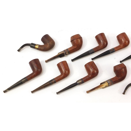 232 - Twelve vintage silver mounted smoking pipes, mostly impressed Antidote