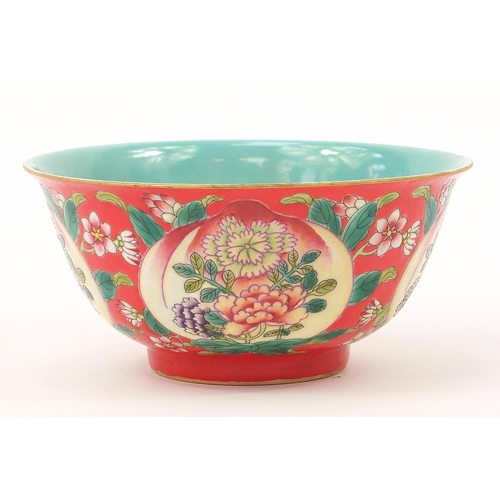 929 - Chinese porcelain red ground bowl hand painted with peaches and flowers, four figure character marks... 