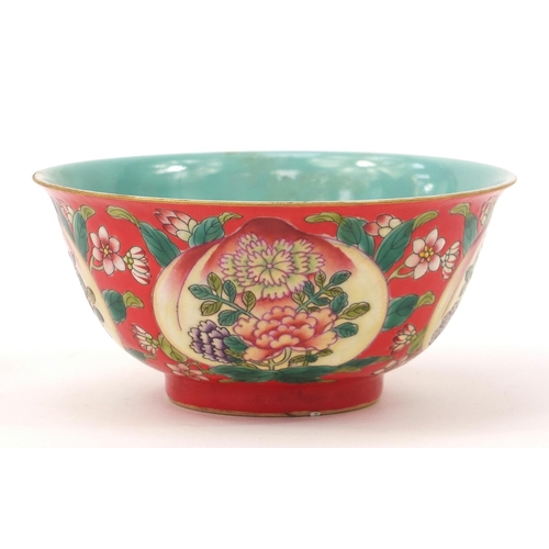 929 - Chinese porcelain red ground bowl hand painted with peaches and flowers, four figure character marks... 