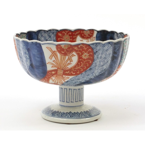 282 - Japanese Imari pedestal bowl hand painted with flowers, 14cm high x 19cm in diameter