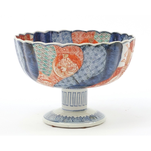 282 - Japanese Imari pedestal bowl hand painted with flowers, 14cm high x 19cm in diameter