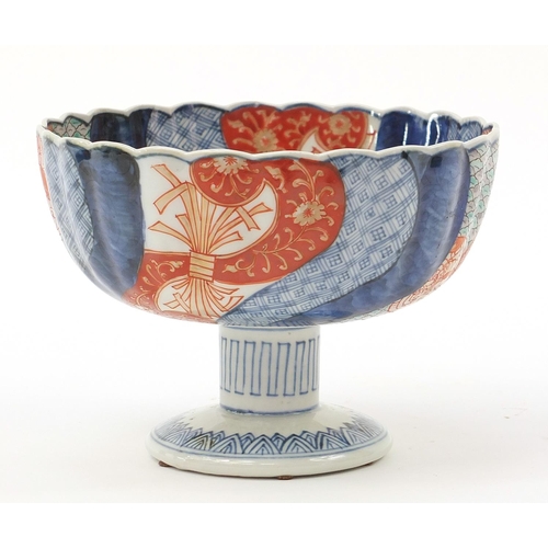 282 - Japanese Imari pedestal bowl hand painted with flowers, 14cm high x 19cm in diameter