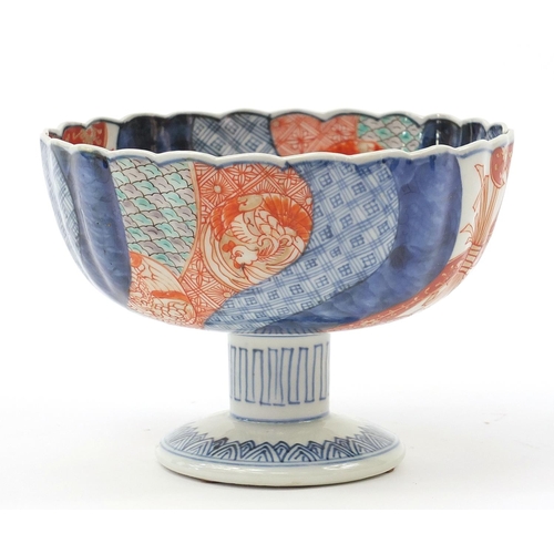 282 - Japanese Imari pedestal bowl hand painted with flowers, 14cm high x 19cm in diameter