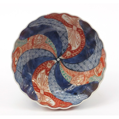 282 - Japanese Imari pedestal bowl hand painted with flowers, 14cm high x 19cm in diameter