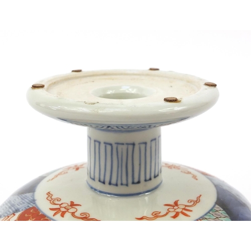 282 - Japanese Imari pedestal bowl hand painted with flowers, 14cm high x 19cm in diameter