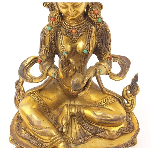 936 - Chino Tibetan patinated bronze jewelled Buddha, 22cm high