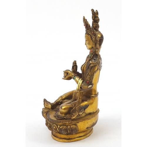 936 - Chino Tibetan patinated bronze jewelled Buddha, 22cm high