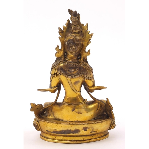 936 - Chino Tibetan patinated bronze jewelled Buddha, 22cm high