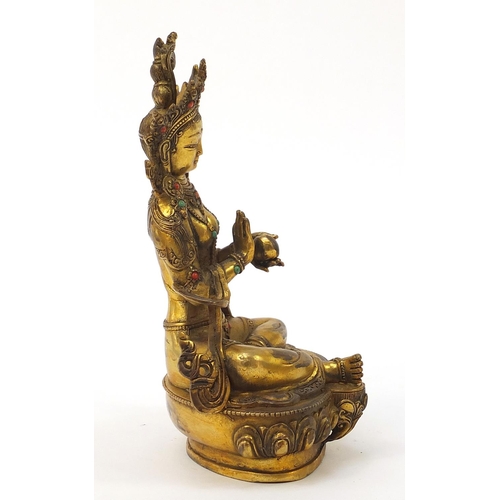 936 - Chino Tibetan patinated bronze jewelled Buddha, 22cm high