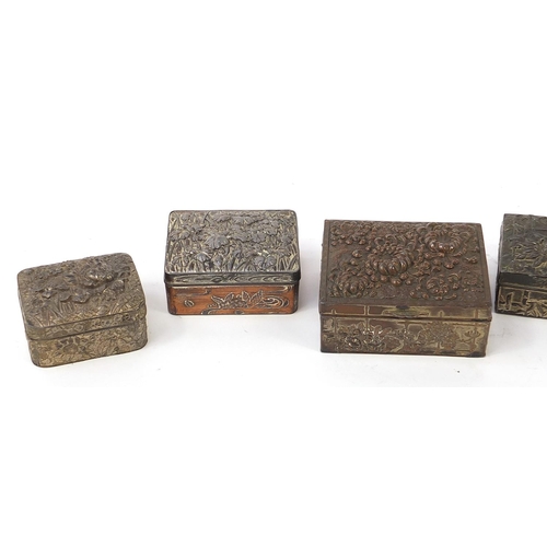 1007 - Six Japanese antimony boxes decorated with flowers, the largest 9cm wide