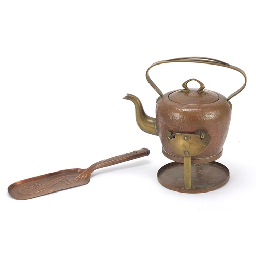 532 - Arts & Crafts planished copper teapot on stand and a crumb scoop embossed with stylised flowers, the... 