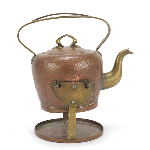 532 - Arts & Crafts planished copper teapot on stand and a crumb scoop embossed with stylised flowers, the... 