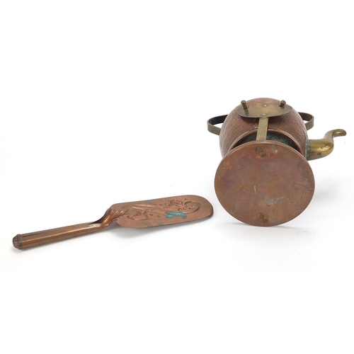 532 - Arts & Crafts planished copper teapot on stand and a crumb scoop embossed with stylised flowers, the... 