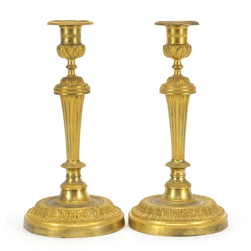 29 - Pair of Antique French Louis XVI style ormolu candlesticks, each 28cm high