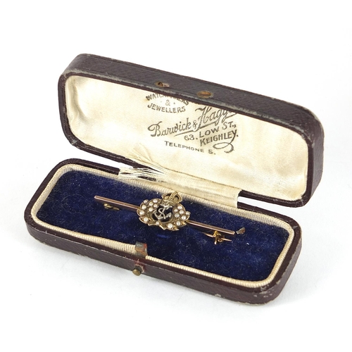 848 - Military interest 9ct gold naval bar brooch set with seed pearls, housed in a Baudick & Haggas fitte... 