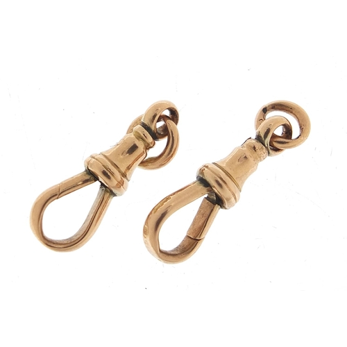 653 - Two Victorian 9ct rose gold swivel clips, each 2.6cm in length, total 4.3g