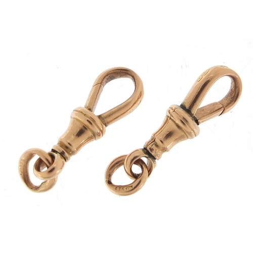 653 - Two Victorian 9ct rose gold swivel clips, each 2.6cm in length, total 4.3g