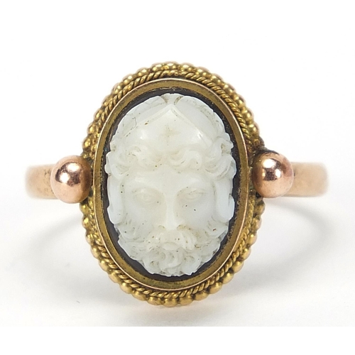 121 - Antique unmarked gold and glass ring, depicting a bust of a mythical figure, size R, 5.2g