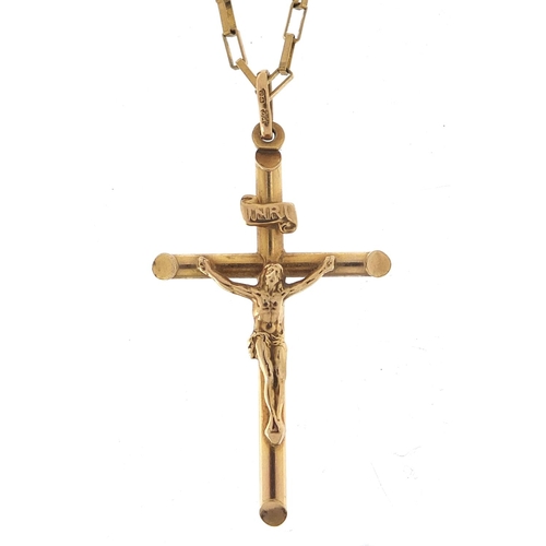 699 - 9ct gold crucifix pendant on 9ct gold necklace, 5cm high and 60cm in length, total 7.8g