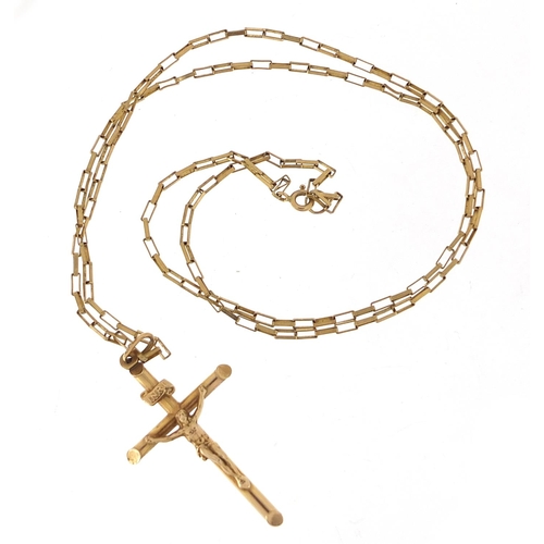 699 - 9ct gold crucifix pendant on 9ct gold necklace, 5cm high and 60cm in length, total 7.8g