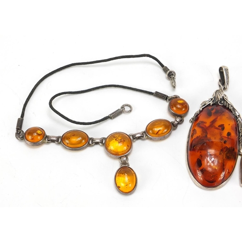 666 - Silver and natural amber jewellery comprising large pendant, necklace, bracelet, earrings and one ot... 