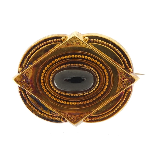 982 - Victorian unmarked gold mourning brooch set with a cabochon garnet, (tests as 15ct gold) 4.5cm wide,... 