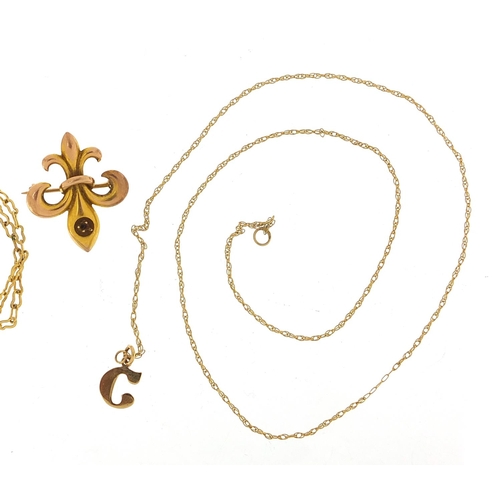 348 - 9ct gold necklace with initial C pendant, a gold coloured metal brooch and necklace, the pendant on ... 