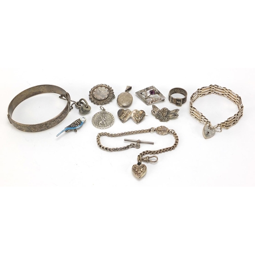 1075 - Antique and later silver jewellery including a Victorian watch chain, four row gate bracelet, marcas... 