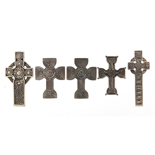 424 - Five silver Celtic cross pendants, the largest 4.6cm high, total 42.5g