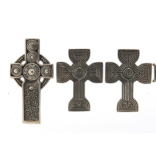 424 - Five silver Celtic cross pendants, the largest 4.6cm high, total 42.5g