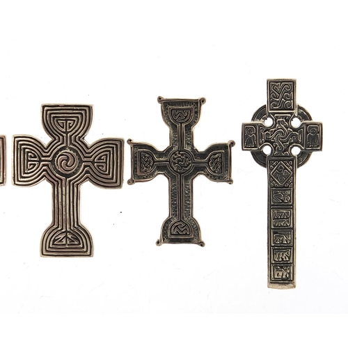 424 - Five silver Celtic cross pendants, the largest 4.6cm high, total 42.5g