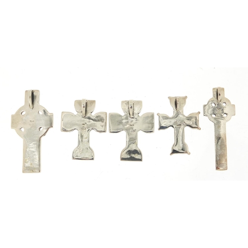 424 - Five silver Celtic cross pendants, the largest 4.6cm high, total 42.5g