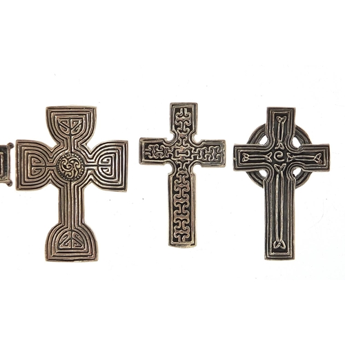 578 - Five silver Celtic cross pendants, the largest 4.6cm high, total 38.5g