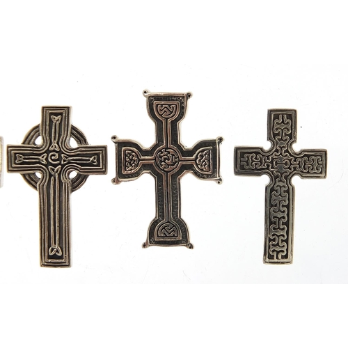 947 - Five silver Celtic cross pendants, the largest 4.6cm high, total 39.6g