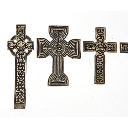 549 - Five silver Celtic cross pendants, the largest 4.6cm high, total 38.3g