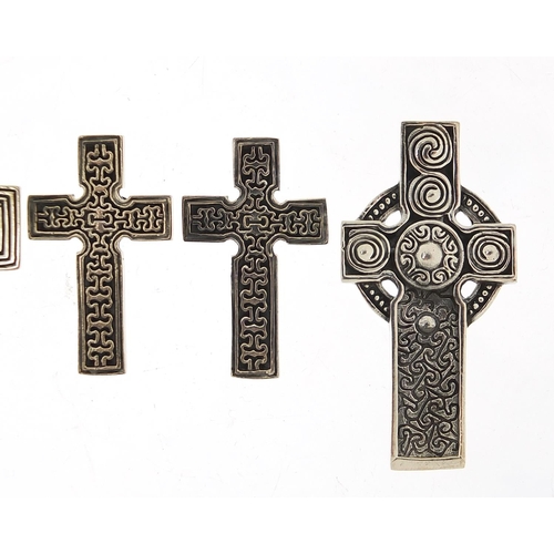 549 - Five silver Celtic cross pendants, the largest 4.6cm high, total 38.3g