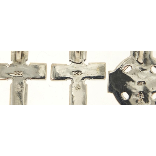 549 - Five silver Celtic cross pendants, the largest 4.6cm high, total 38.3g