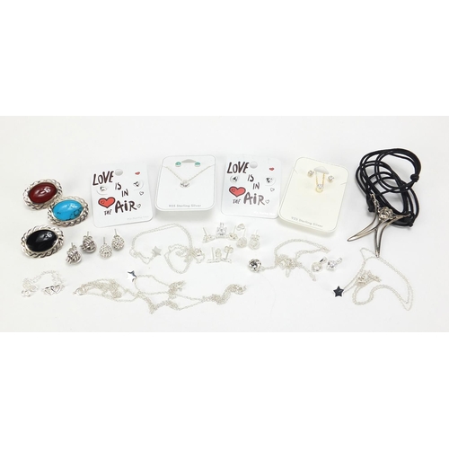 658 - Silver jewellery including three cabochon stone brooches, earrings, necklaces and a monkey pendant w... 