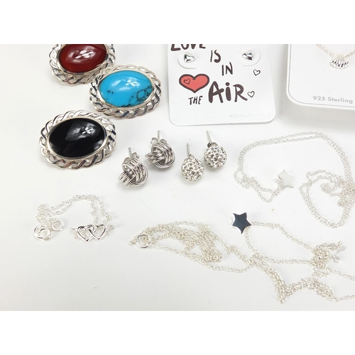 658 - Silver jewellery including three cabochon stone brooches, earrings, necklaces and a monkey pendant w... 