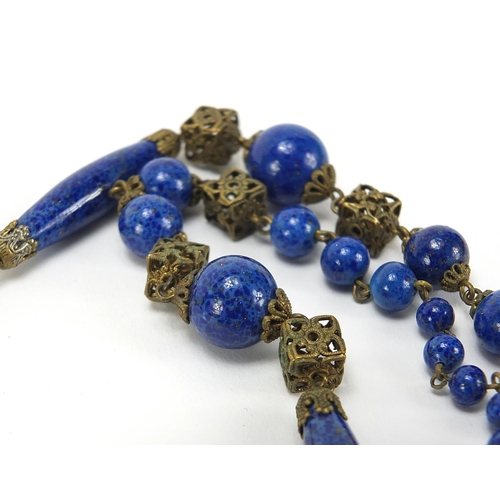 623 - Three vintage necklaces comprising lapis lazuli, coral and faux ivory