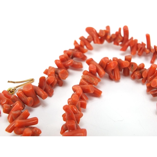 623 - Three vintage necklaces comprising lapis lazuli, coral and faux ivory