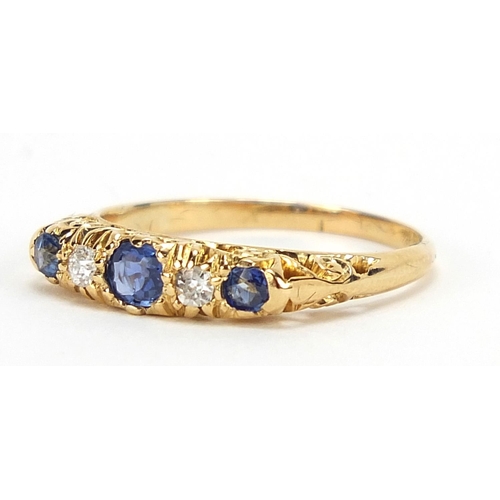 307 - George V, 18ct gold sapphire and diamond five stone ring with scrolled and pierced setting, Chester ... 