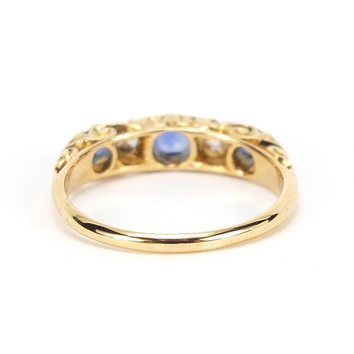 307 - George V, 18ct gold sapphire and diamond five stone ring with scrolled and pierced setting, Chester ... 