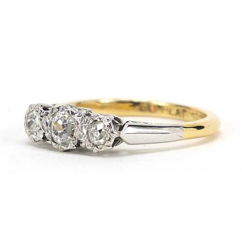 738 - 18ct gold and platinum diamond three stone ring, the centre diamond approximately 3.4mm in diameter,... 