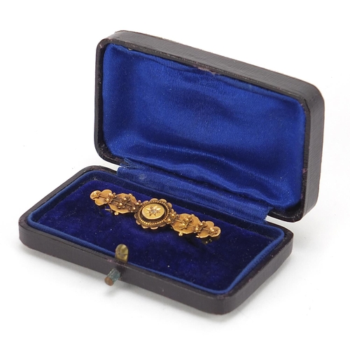 454 - Victorian 15ct gold diamond bar brooch housed in a velvet and silk lined fitted box, 4.2cm wide, 3.0... 