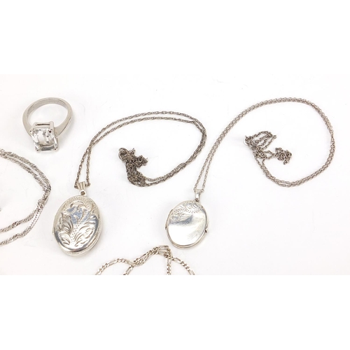 651 - Silver jewellery comprising two lockets on chains, four pendants on chains and two rings, total 68.0... 